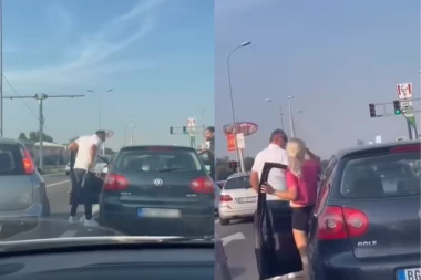 POGLEDAJTE KAKO DVE BITANGE PALICOM NASRĆU NA ŽENU USRED SAOBRAĆAJNE GUŽVE! Horor scena u Beogradu! (VIDEO)